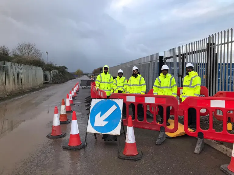 Koast Southern trainees in hi-vis behind barriers, cones and a keep-left sign on a practical street works exercise